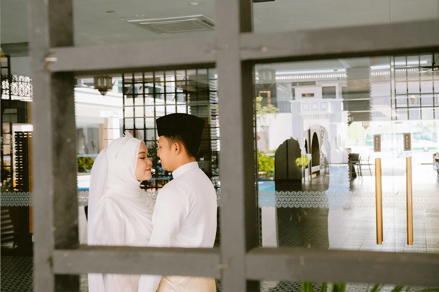 Malay bride seated for a wedding portrait